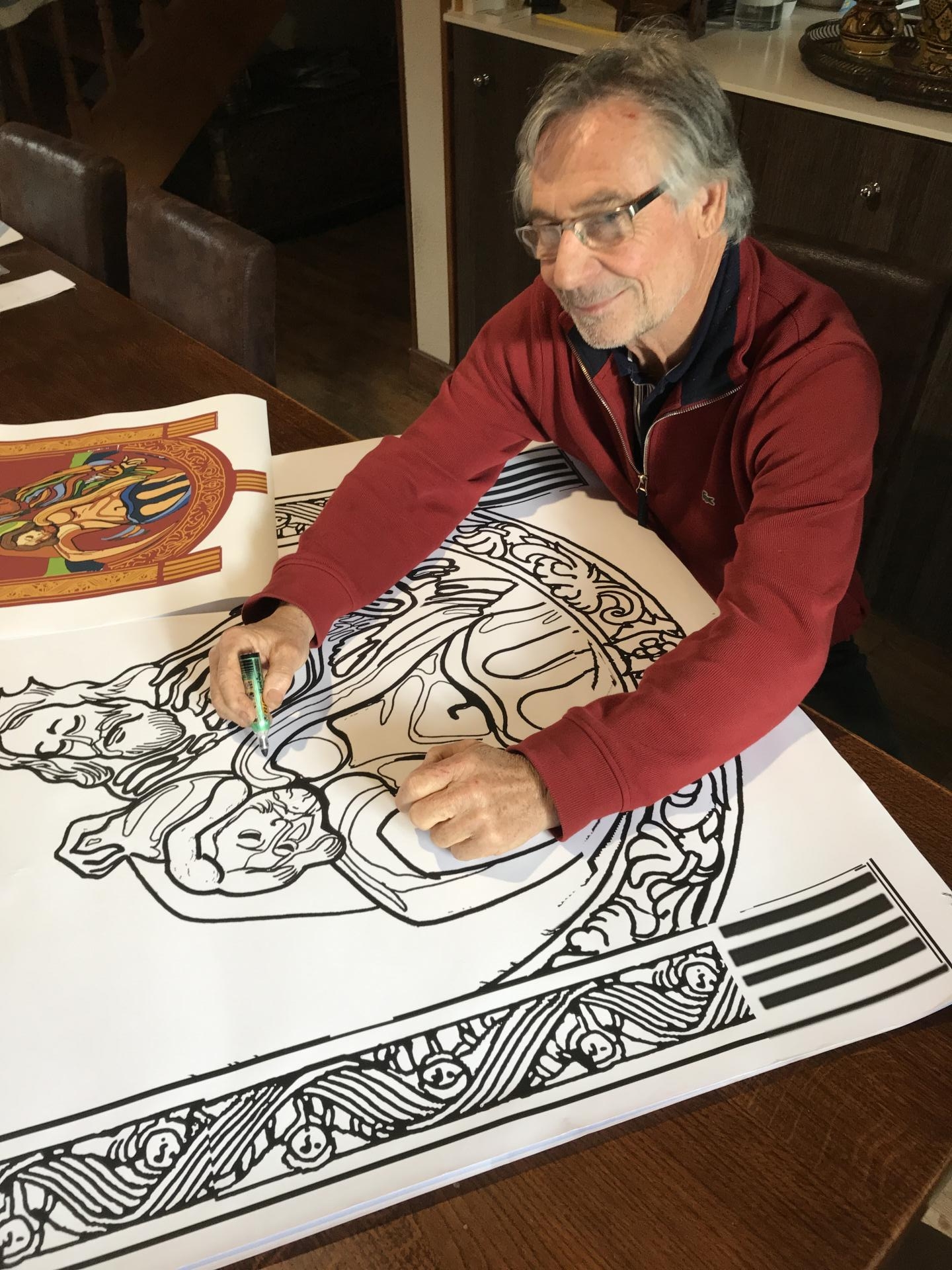 Jean poitel dessinne la bannière Trinité-Langonnet APPROM